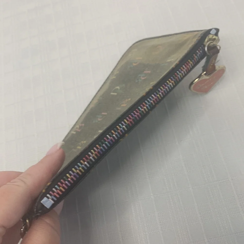 Vintage Dooney and Bourke oversized wristlet with rainbow zipper